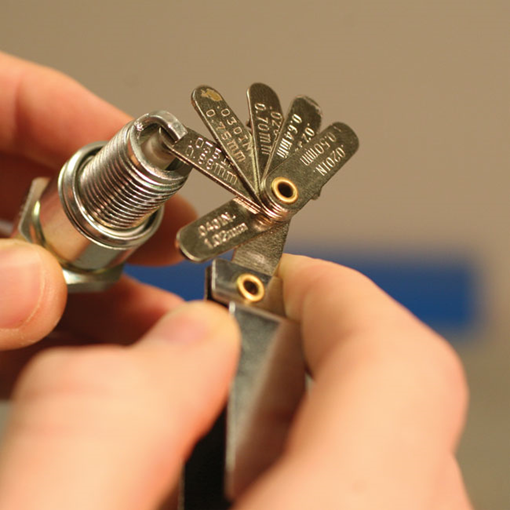 Spark plugs guide and fitting